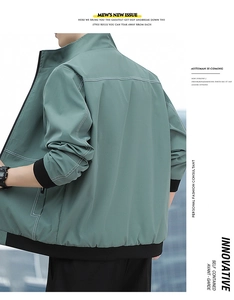Detail of cargo jacket featuring contrast white stitching on the back and ribbed cuffs