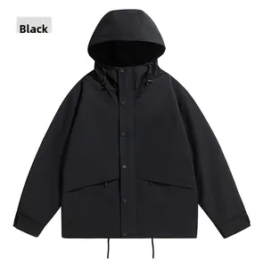 Detail of black hooded windbreaker jacket with adjustable drawstring and matte finish fabric