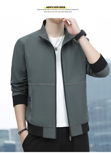 Detail of cargo jacket with white topstitching and elastic ribbed cuffs on sleeve
