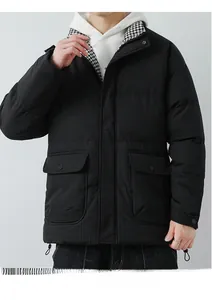 Detail of men's quilted jacket featuring houndstooth collar and large flap pockets