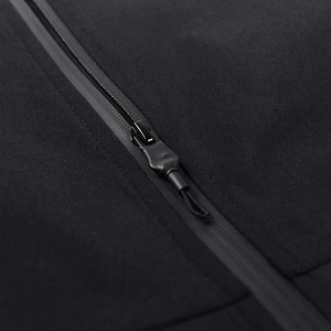 Men's outdoor jacket featuring waterproof matte zippers and fine textured black fabric
