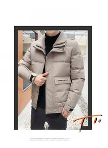 Detail of winter jacket showing faux fur collar, zipper closure and pocket print