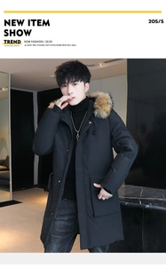 Detail of men's hooded parka featuring a plush faux fur collar and functional sleeve pocket