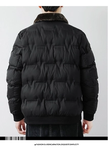 Rear view of quilted men's black winter puffer jacket featuring a warm dark fur collar