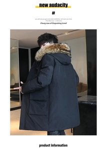 Detail of men's winter parka featuring a large faux fur hood and utility flap pockets