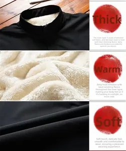 Detail view of the black jacket featuring a warm white faux fleece lining and zipper closure