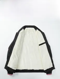 Detail of men's casual jacket with thick white fleece lining and striped ribbed cuffs