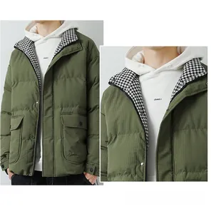 Detailed close-up of olive green puffer jacket featuring houndstooth inner collar texture