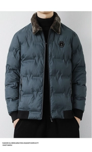 Detail of men's winter jacket with dark brown fur collar and logo on chest pocket