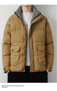Detail of camel puffer jacket showing houndstooth collar lining and ripstop texture