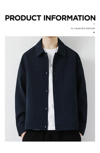 Detail of dark blue waffle-knit texture and button closure on men's lapel jacket
