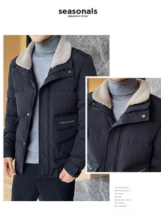 Detail view of winter jacket featuring beige faux shearling collar and black quilted fabric