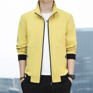 Modern men's bright yellow casual work jacket with stand collar and black ribbed cuffs