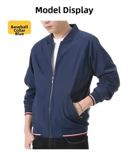 Close-up of men's navy baseball jacket featuring striped rib cuffs and zipper detail