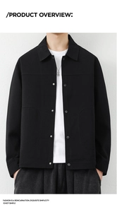 Detail shot of men's black waffle texture jacket with classic lapels and button closure