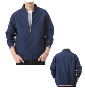 Detail of navy blue bomber jacket with tri-color striped ribbing on collar and cuffs