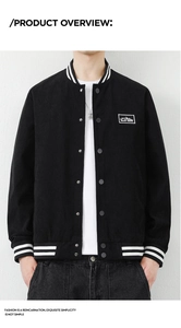 Detail of black corduroy jacket showing striped ribbed collar and mountain chest patch