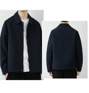 Detail of waffle textured men jacket showing classic collar and button-down front style