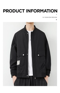 Detail of black work jacket featuring cargo flap pockets and silver metal snap buttons