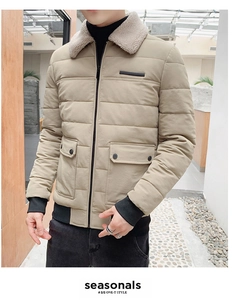 Close-up of khaki winter jacket featuring fleece collar and ribbed knit cuffs detail
