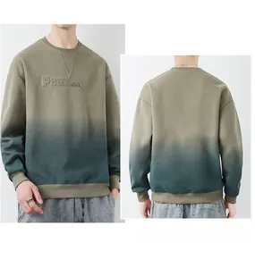 Detailed view of the 3D embossed Peacecat logo on olive green gradient sweatshirt