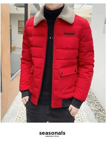 Detail of men's red winter jacket featuring a grey fleece collar and cargo pockets