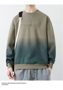 Detail of 3D embossed peacheat lettering on gradient cotton sweatshirt for men
