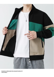 Detail of color-block stand collar zip-up jacket with premium interior stitching