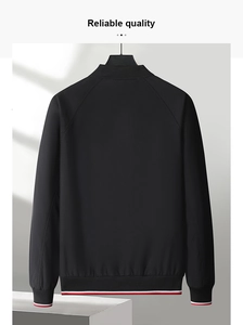 Rear view of black sports jacket showing tricolor striped ribbed cuffs and hem details