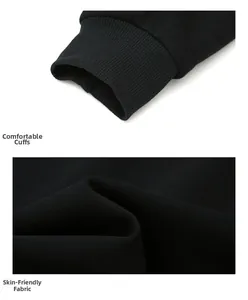 Détail du sweat à capuche noir montrant les poignets côtelés et le tissu doux et soyeux