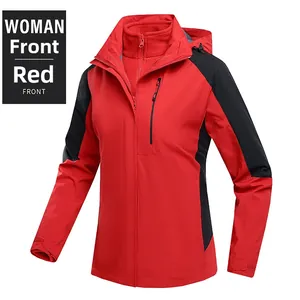 Close-up of red women's outdoor jacket with 3-in-1 fleece lining and waterproof details