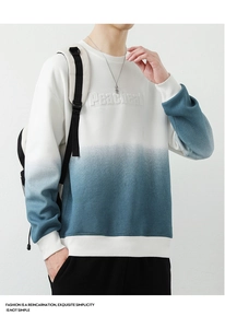 Detail of 3D embossed text on men's relaxed fit blue and white gradient sweatshirt