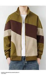Detail of color-block stand collar sweatshirt with high-quality zipper and ribbed cuffs