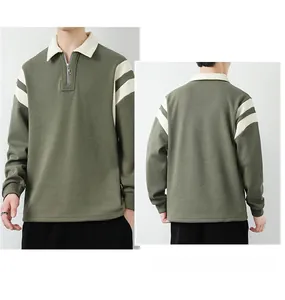Detail of army green polo sweatshirt showing white lapel collar and sleeve stripes