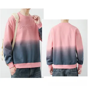 Detail of Peacheat gradient pink to blue crewneck sweatshirt with embossed letters