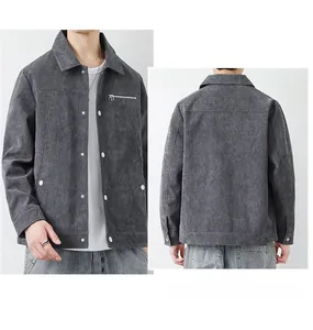Detail of dark grey corduroy jacket featuring metal snap buttons and chest zipper pocket