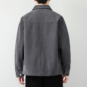 Back view of men's dark grey corduroy jacket with dropped shoulders and relaxed fit