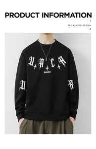 Detail of black crewneck sweatshirt featuring white Gothic lettering and star prints