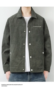 Detail view of corduroy jacket with silver metal snaps and zip chest pocket decoration