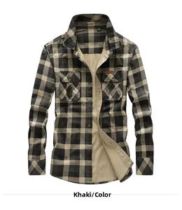 Close-up of khaki plaid cotton shirt with dual utility pockets and leather logo patch