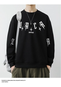 Detailed view of the gothic UPCR lettering print on the black round neck sweatshirt for men