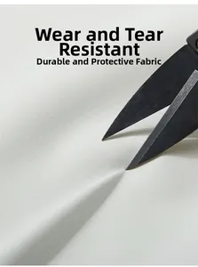 Détail du tissu extérieur blanc durable montrant la résistance à l'abrasion et déchirure
