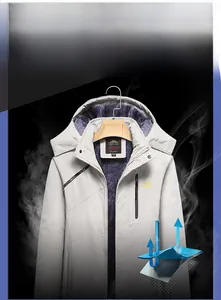 Detail of grey windproof jacket with purple fleece lining for winter warmth and breathability
