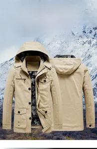 Detailed view of khaki military jacket with inner camouflage lining and multi-pocket design