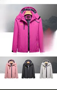 Detail view of fleece lining and four colors of women's hooded waterproof ski jackets