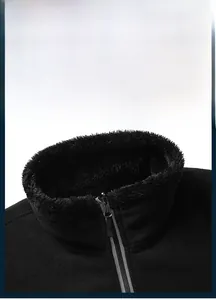 Detail of high collar on fleece jacket with warm plush lining and durable zipper