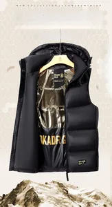 Detail of hooded black down vest with golden graphene thermal lining and brand logo