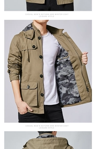 Detail of cargo jacket showing camouflage lining and large utility pockets on the front