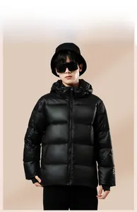 Detail view of shiny black hooded puffer jacket showing windproof knit cuffs with thumbholes