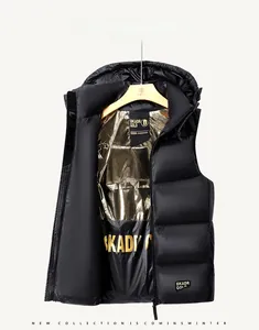 Detail of black puffer vest featuring gold honeycomb metallic lining for thermal warmth